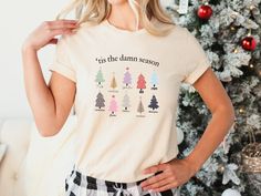 Tis The Damn Season Shirt, Christmas Shirt ,Song Lyric Shirt, Holiday Shirt, Fan Gift Shirt, Xmas Gift Shirt, Merry Xmas Shirt, Xmas Shirt HOW TO ORDER 1 - Please check and review all listing photos. 2 - Please pick your t-shirt type and size. 3 -  Please pick your t-shirt color. 4 - Select the quantity. 5 - Click add to cart. 6 - Please click "Continue to Payment". PRODUCT INFORMATION ⭐ We have a size chart on our listing photos ⭐ All our simple color ones like White and Black are 100% Cotton ⭐ Christmas Song Shirts, Christmas Cotton T-shirt With Screen Print, White Christmas Festive T-shirt, Christmas Cotton T-shirt With Text Print, Christmas Screen Print Short Sleeve T-shirt, Tis The Damn Season, Lyric Shirts, Xmas Shirts, Song Lyric