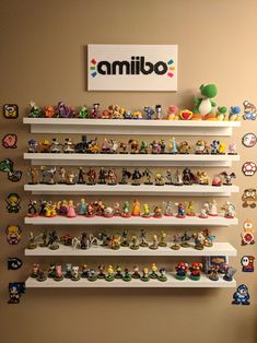 the shelves are filled with various nintendo figurines