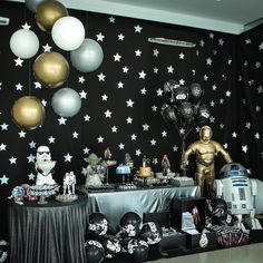 a star wars themed party with balloons and decorations