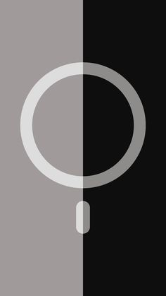 a black and white photo with a gray circle on the left, and a grey circle on the right