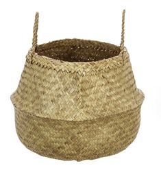 a basket that is sitting on top of a white surface and has rope around it