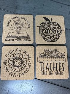 four coasters with words on them and an apple in the middle one says teachers