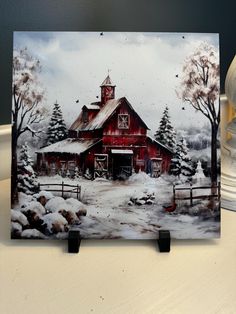 a painting of a red barn in the snow