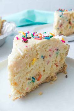 a slice of birthday cake with sprinkles on it