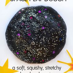 a black rock with stars on it and the words space labboon above it