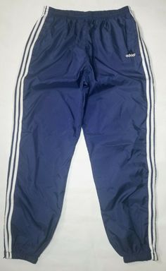 VINTAGE ADIDAS 100% NYLON MEN'S ATHLETIC PANTS SIZE: XL COLOR: BLUE w/ WHITE STRIPES EXCELLENT OVERALL CONDITION.  FEATURE HAND POCKETS, DRAWSTRING WITH ELASTIC WAISTBAND, AND CUFFED ZIP UP ANKLES. PLEASE SEE ALL PICS AND ASK ANY QUESTIONS PRIOR TO BUYING. THANK YOU FOR VISITING THROWBACK SPORTS APPAREL Adidas Track Pants Outfit Men, Adidas Track Pants Outfit, Blue Pants Men, Track Pants Outfit, Mens Athletic Pants, Track Pants Mens, Pants Adidas, Pants Outfit Men, Adidas Vintage