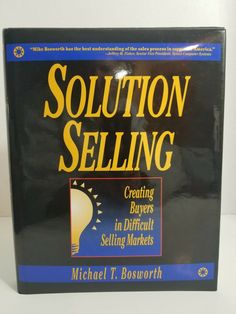 the book solution selling by michael t bosworth is shown on a white table top