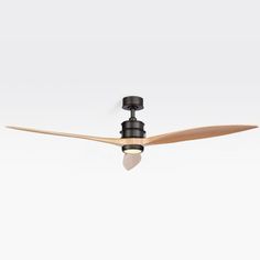 a black ceiling fan with wooden blades on it's blades and two light bulbs