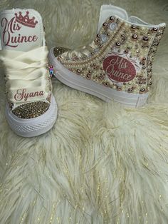 Custom Bling Converse All Star Chuck Taylor Sneakers. All designs handmade and embellished with a variety of high-quality crystals. Great for Quince's, weddings, proms, homecomings, birthdays, special events or just your everyday girly girl. Shoe Size: WOMEN'S size 5 to size 12 Size availability may vary based on our supplier's current inventory. If your size is out of stock at the time of your order, we will notify you within 48 hours. ** PLEASE NOTE CONVERSE CHUCK TAYLOR SNEAKERS RUN ABOUT A WHOLE SIZE BIG, IF YOU'VE NEVER HAD A PAIR, I STRONGLY RECOMMEND TRYING A PAIR ON TO ENSURE CORRECT SIZE. ** White Monochrome high-top All-Star Converse Embellished with high quality Rose gold & Champagne crystals. Embellished with Rose gold & Ivory pearls. Ivory Satin ribbon laces (original shoestri Bling Converse, Ribbon Laces, Star Converse, High Top Converse, Custom Bling, All Stars Converse, Gold Champagne, Cute Nike Shoes, Cute Nikes