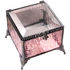 a pink glass box with a poem on it