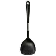 a black spatula on a white background with a silver handle and an empty spoon