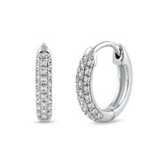 Top off your favorite looks with the timeless design of these diamond triple-row hoop earrings in white gold. Fashioned in cool 10K white gold Each hoop showcases three rows of diamonds sparkling along the rounded front edge. Radiant with 1/6 ct. t.w. of diamonds These earrings secure with hinged backs. Peoples Jewellers, Diamond Hoop Earrings, Hoop Ring, The Row, Timeless Design, Diamond Earrings, Hoop Earrings, Diamonds, White Gold