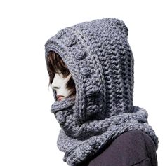 Discover our unique winter knitwear - perfect for chilly days. This stylish winter shawl with a chunky hood will keep you warm and comfortable in any situation. Made from soft wool, this hooded snood wraps around both your neck and head, protecting you from wind and cold. As a fashionable and comfortable accessory, this chunky hood scarf is ideal for winter walks and everyday outings. Its versatility makes it a perfect choice for any winter outfit, while its seasonal charm adds a touch of elegan Winter Wool Knitting Pattern, Handmade Winter Knitting Pattern One Size, Winter Wool Hand Knitted Pattern, One Size Wool Knitting Pattern For Winter, Winter Wool Hand-knitted Pattern, Cozy Winter Wool Knitting Pattern, Cozy Wool Knitting Pattern For Winter, Gray Chunky Knit Pattern For Winter, Winter Gray Chunky Knit Pattern