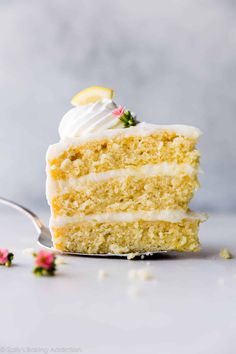 a slice of lemon cake with white frosting