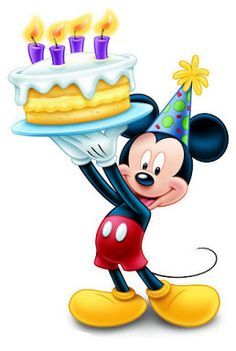 a mickey mouse holding a birthday cake with candles on it