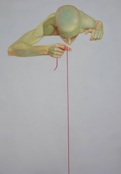 a painting of a person holding onto a red string with one hand and the other leg