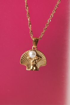 The Venus Necklace boasts a feminine aura, complete with a pearly seashell pendant. Embrace your inner beauty with this unique piece! Product Details Size: 40+5cm 18K Gold Plated Stainless Steel Water-Resistant HypoallergenicDurable Venus Necklace, Venus Jewelry, Feminine Aura, Venus Symbol, Sun Goddess, Seashell Pendants, Inner Beauty, Aphrodite, Fall 2024