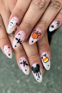 You're in for a treat with our line up of 30+ spooky (but spectacular) nail designs for Halloween that will even impress your manicurist! Candy Corn Nails, Disney Nail Designs, Minnie Mouse Nails, Holloween Nails