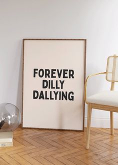 a poster with the words forever, dilly, dalying on it next to a chair