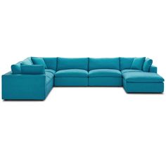 a blue sectional couch with pillows on it