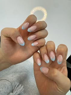 Light Blue Tips Nails Almond, Sparkly Blue French Tip Nails Almond, Light Blue French Tip Chrome, Icy Blue French Tip Nails, Light Blue Purple Nails, French Tip With Blue Line, Light Blue Chrome French Tip Nails, Blue French Tip With Chrome, Blue Sparkle French Tip Nails