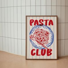 a sign that says pasta club on it in front of a wall with white tiles