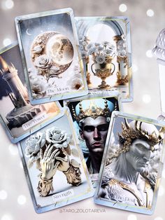 four tarot cards with images of the same character