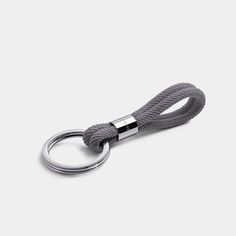 Our Classic Alchor design turns into a sleek keychain. The double nylon rope design makes this keychain extremely durable. Made out of silver plated stainless steel, the key ring will stand the test of time and hold an array of key shapes and accessories. Features our signature Elegatto logo.Available in 3 colors. This nautical keychain comes protected in a soft velvet pouch with a quality card and presented in the original Elegatto gift box. Nautical Keychain, Knot Keychain, Rope Keychain, Best Looking Watches, Measure Ring Size, Rope Design, Velvet Pouch, The Double, Ring Size Guide