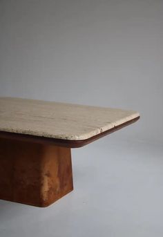 a marble top coffee table in the style of paul mcc, circa 1950's