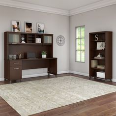 a living room scene with focus on the desk and bookcase