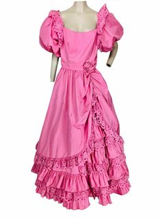 Gorgeous vintage 1970's pink tiered lace trim, tulle lined, puff bubble sleeve, on/off shoulder, medieval Victorian Southern Belle princess ball gown dress, gathered at the hip with rosette applique, low v-back, hidden rear zipper closure, size is marked 11 fits a modern medium, large, XL depending on your measurements please refer to measurements for accurate fit. *please note I used a crinoline to puff the skirt of the dress, this crinoline is NOT included in the sale approximate measurements 70s Prom Dress, 70s Prom, Belle Princess, Formal Ball Gown, Ball Gown Dress, Lace Ball Gowns, Princess Ball Gowns, Bubble Sleeve, Ball Gown Dresses