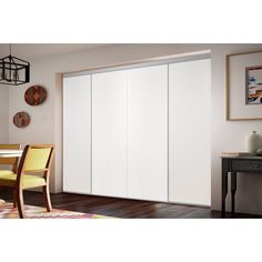 a white sliding door in a dining room