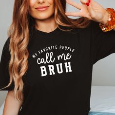 "Introducing our funny mom shirt \"My Favorite People Call Me Bruh\" the perfect blend of comfort and humor for all the fabulous moms out there! Embrace your inner cool mom with this witty and playful crewneck that lets the world know you're not just a mom, but a \"bruh\" to your favorite people. Made from soft cotton, this comfort colors shirt ensures maximum comfort for all-day wear. The \"My Favorite People Call Me Bruh\" Mom Shirt makes an awesome birthday or mother's day gift for yourself or any awesome mom in your life who appreciates a good laugh. Embrace the lighthearted side of motherhood and showcase your unique sense of style with this trendy mama t-shirt. COMFORT COLORS SHIRT: ♡ 100% cotton ♡ Relaxed Fit ♡ Unisex sizing ♡ Actual printed colors may vary slightly from computer sc Mother's Day Funny Shirt With Letter Print, Funny Shirt With Print For Mother's Day, Funny Print Shirt For Mother's Day, Funny Graphic Print Shirt For Mother's Day, Momma Mommy Mom Bruh, Mom Bruh Shirt, Mama Bruh Shirt, Mother's Day Gift T-shirt With Funny Text, Funny Customizable T-shirt For Mother's Day