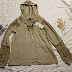 Hooded Bnwt Miss Me Shirt. The Color Is Sage Green, And It Has Beautiful Detailed Sleeves. It’s A Size Xs. The Color Is Perfect For All Seasons! I’m Happy To Bundle And Provide Measurements :) Tags: Brand New With Tags, Casual, Comfortable Casual Long Sleeve Tops With Drawstring Hood, Casual Spring Hoodie Top, Khaki Long Sleeve Hoodie For Spring, Long Sleeve Tops With Drawstring Hood For Fall, Khaki Drawstring Hood Top For Fall, Khaki Hoodie Top For Fall, Khaki Drawstring Hood Top For Streetwear, Khaki Hoodie Tops For Winter, Khaki Streetwear Top With Drawstring Hood