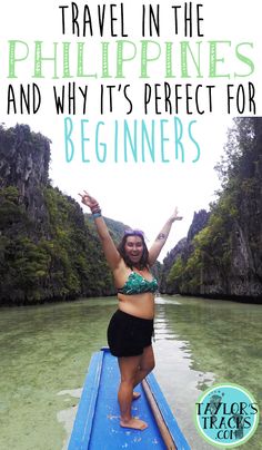 a woman standing on top of a blue boat in the water with text overlay that reads travel in the philippines and why it's perfect for beginners