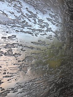 rain drops on the side of a window