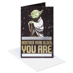 a card with an image of yoda from star wars on it, and the words another year older you are