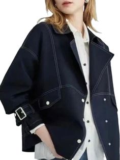 Casual look denim jacket. European design. Metallic buttons down front closure. Hide pockets on front. Crop length. Rounded hem. Adjustable buckled on sleeves. Cotton fabric. Color may be lighter or darker depending of the device it is displayed. Short Jackets For Women, Loose Shorts Women, Coat Streetwear, Short Jackets, Mode Mantel, Ladies Short Jackets, Suit Collar, Romper And Jacket, Loose Top