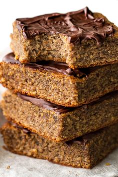 four pieces of chocolate - covered banana bread stacked on top of each other