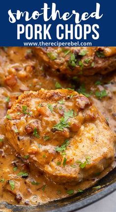 two pork chops covered in gravy and garnished with parsley