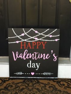 a sign that says happy valentine's day on the side of a door way