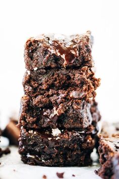 three chocolate brownies stacked on top of each other