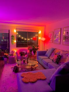 a living room filled with furniture and lights