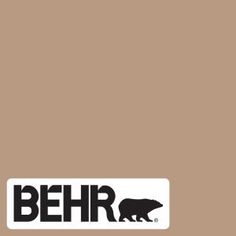 the logo for behr is shown in black and white on a brown background with an image of a bear