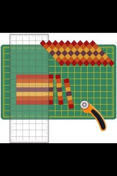 an image of a cutting mat with scissors and tape next to it on a computer screen