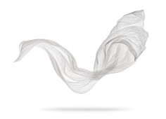 white fabric flying in the air on a white background