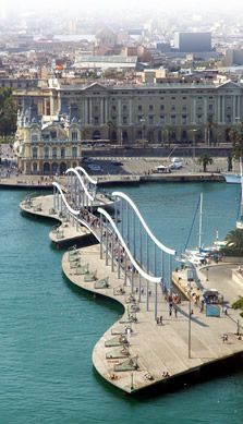 an aerial view of a city and the water