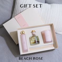 ELEGANT HOME FRAGRANCE TRIO: Includes a candle, room spray, and reed diffuser with a delicate blend of rose and sandalwood. READY FOR GIFTING: Beautiful off-white packaging makes this set an ideal gift for housewarmings, birthdays, and more. INSPIRED BY SERENE COASTLINES: Part of the Sun-Kissed Collection, bringing the tranquility of California’s beaches into your home. PREMIUM QUALITY AND LONG-LASTING: Made with high-quality ingredients for an enduring and sophisticated scent. VERSATILE AND REF Fragrance Gift Set Rose, Chevron Jewelry, Square Jewelry, Wooden Wick Candles, Rose Gold Christmas, Chevron Earrings, Rose Fragrance, Carnation Flower, Rose Gift