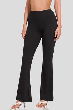 Achieve ultimate comfort and style with our Zenana Buttery Soft Flare Leg High Waist Yoga Pants. Made from soft and stretchy fabric, these pants provide a flattering high-waisted fit and a trendy flare leg. Perfect for yoga, lounging, or running errands, they offer all-day comfort and versatility. Details:- Elastic Waistband- Flare Leg- Perfect Stretch + Recovery Fabric:- 90% Polyester, 10% Spandex Black High-waist Relaxed Fit Yoga Pants, Compressive High Waist Black Yoga Pants, Black High-waist Yoga Pants With Wide Waistband, Black Non-stretch Yoga Pants, Black Yoga Pants With 4-way Stretch, High Waist Yoga Pants, Racerback Tank Top, We Wear, Stretchy Fabric