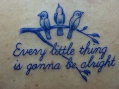 the back of a woman's shoulder with two birds on it and an inscription that says, every little thing is goma be alright